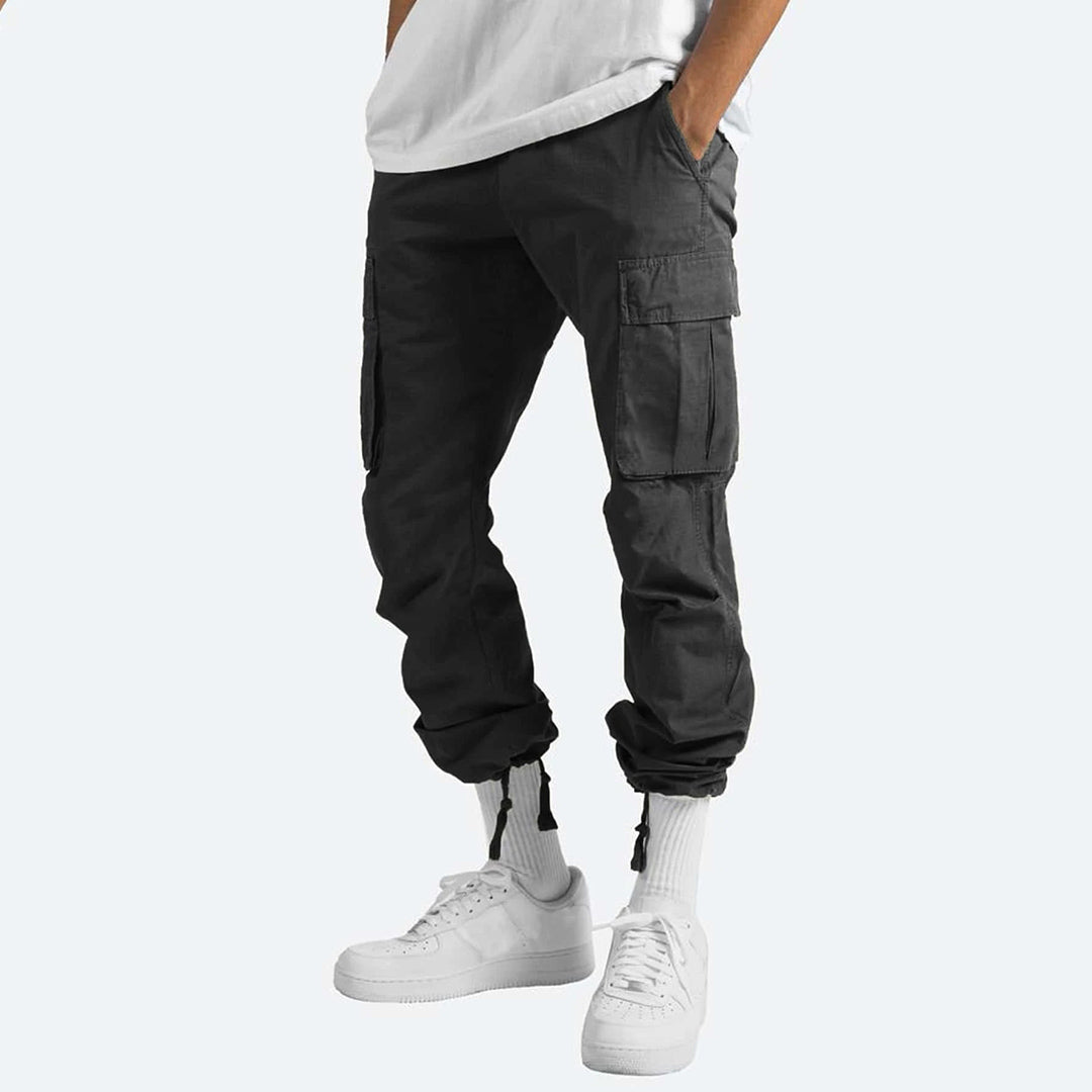"Moderne heren cargo broek met cargozakken, comfortabele pasvorm, diverse kleuren, ideaal voor stijl en functionaliteit."