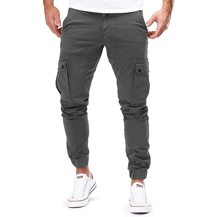 "Moderne heren cargo broek met elastische taille, ruime zakken en trendy ontwerp voor comfort en stijl."