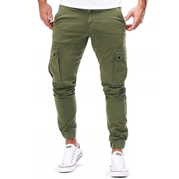 "Moderne heren cargo broek met elastische taille, ruime zakken en trendy ontwerp voor comfort en stijl."