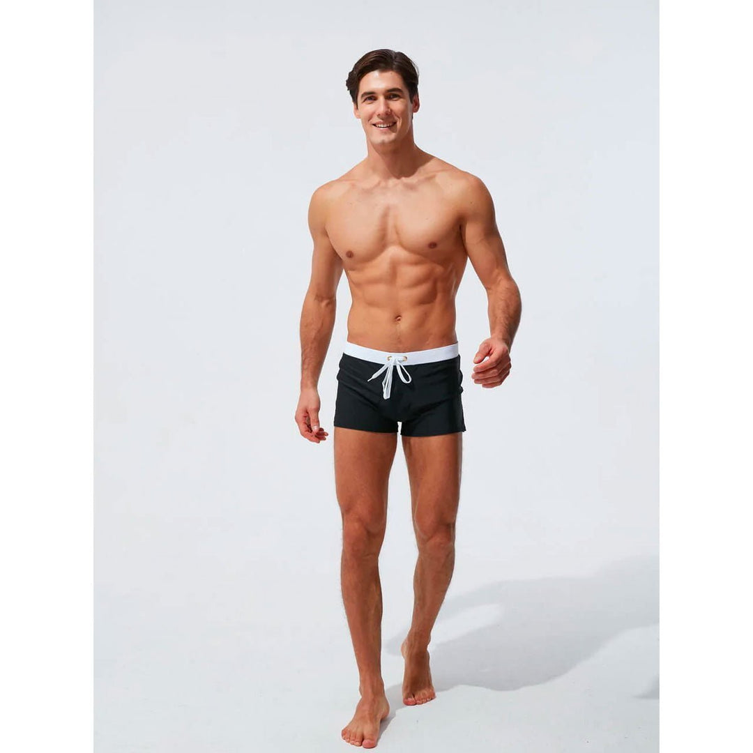 Stijlvolle badkleding heren; een moderne zwembroek voor ontspanning en actie. Zomer essentieel.