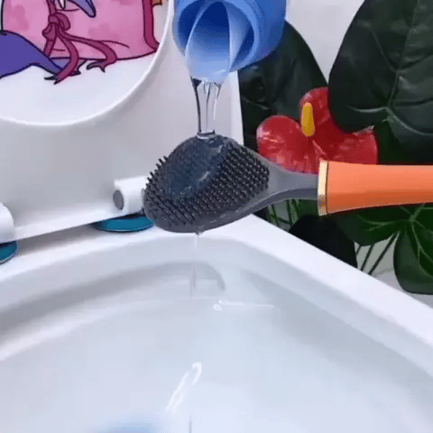 "Moderne toiletborstel CleanGuard met borstelharen in groen, oranje, wit voor hygiënische badkamerreiniging."