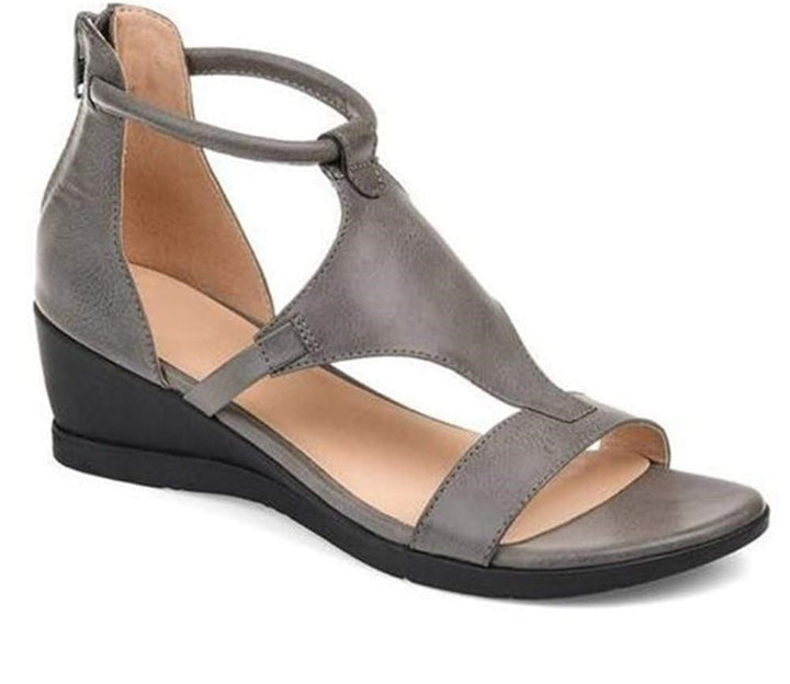 Moderne dames sandalen met comfortabele wigzool. Perfecte stijlvolle zomerslipper voor voetcomfort.