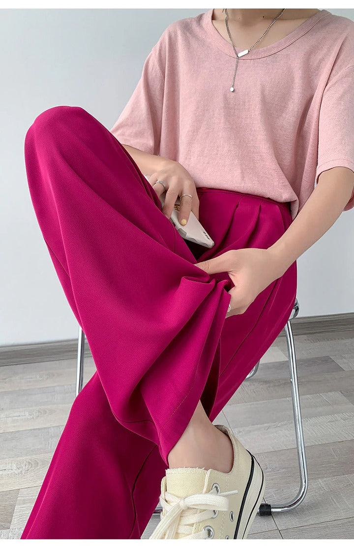 Professionele damesbroek met wijde pijpen en hoge taille, ideaal als comfortabele en stijlvolle kantooroutfit.