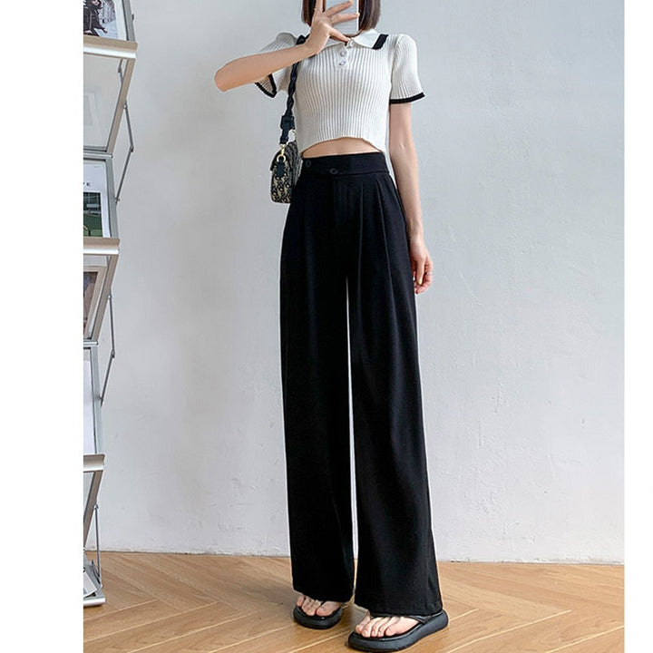 Luchtige dames zomerbroek met wijde pijpen en hoge taille, ideaal voor een chique en comfortabele zomeroutfit.