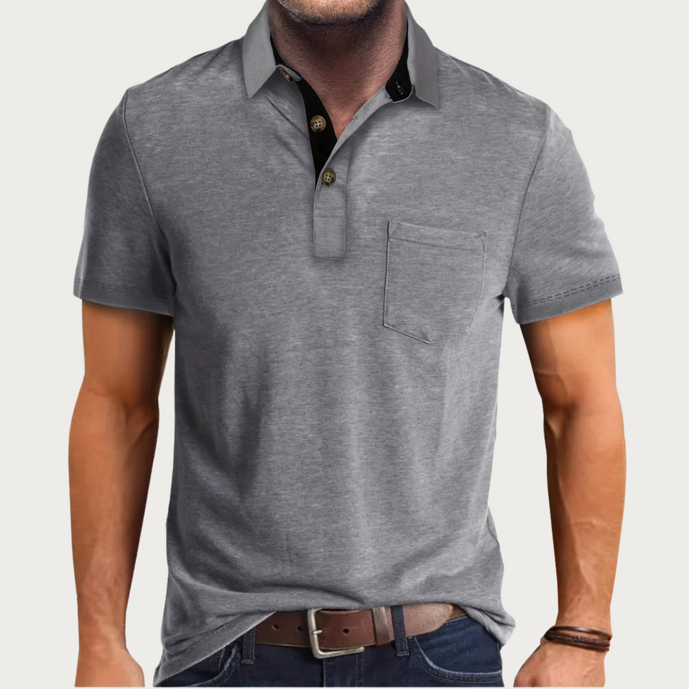 Modieus heren poloshirt met borstzak en korte mouwen, perfect voor een smart casual zomerlook. Comfortabel en trendy.