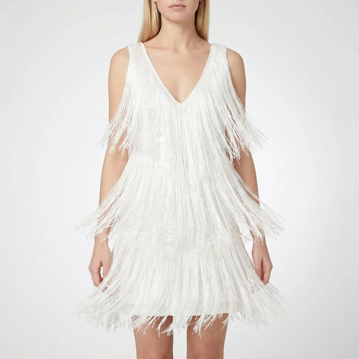 Glinsterende feestjurk voor dames met fringe details; ideaal als cocktailjurk of avondjurk voor uitgaan.