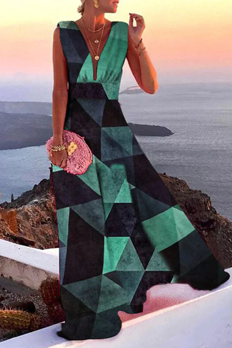 Modieuze Layla vakantiejurk met levendige bloemenprint, ideaal als strandjurk of comfortabele casual jurk.