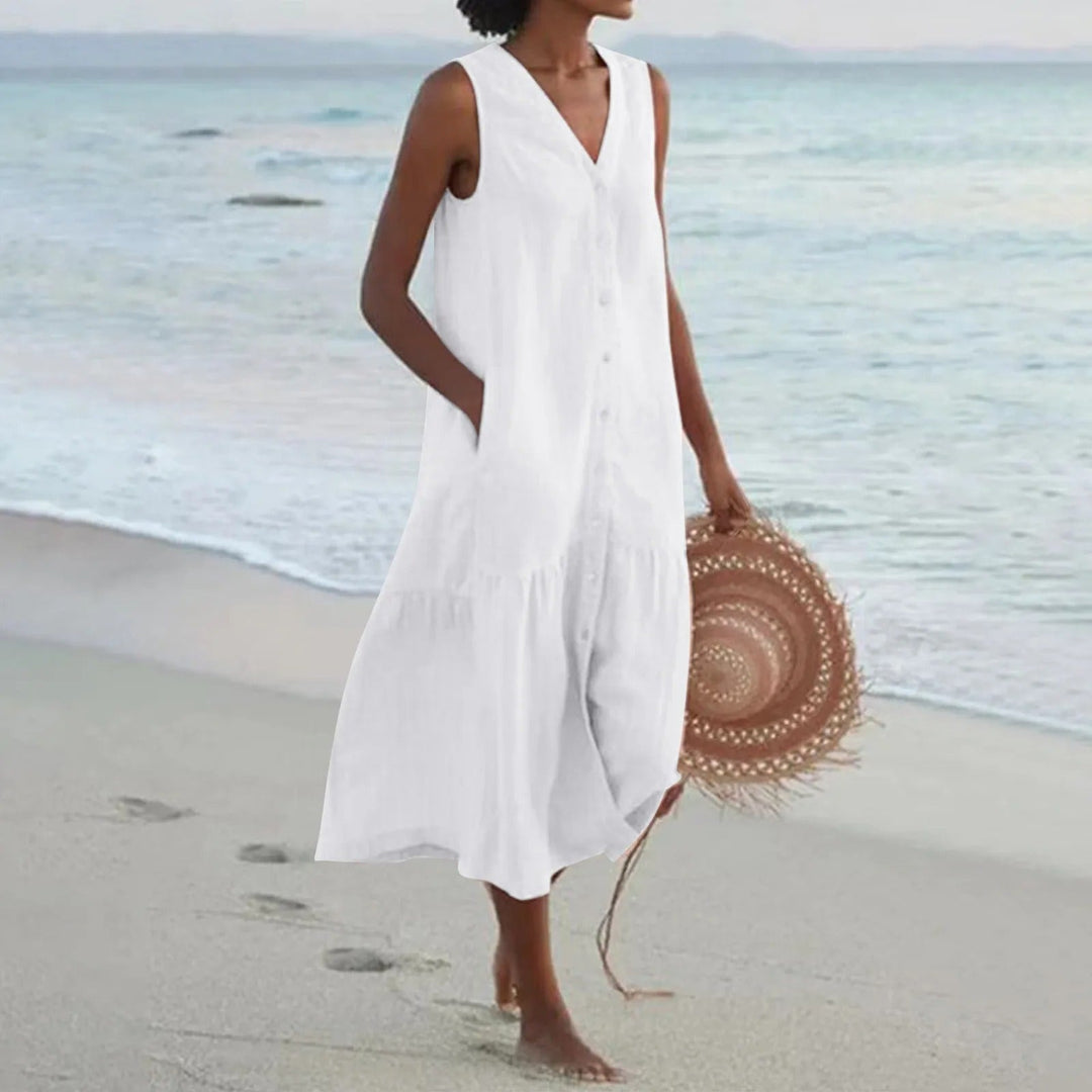Mouwloze dames zomerjurk met V-hals voor een casual en comfortabele look, ideaal voor vakantie of strand.