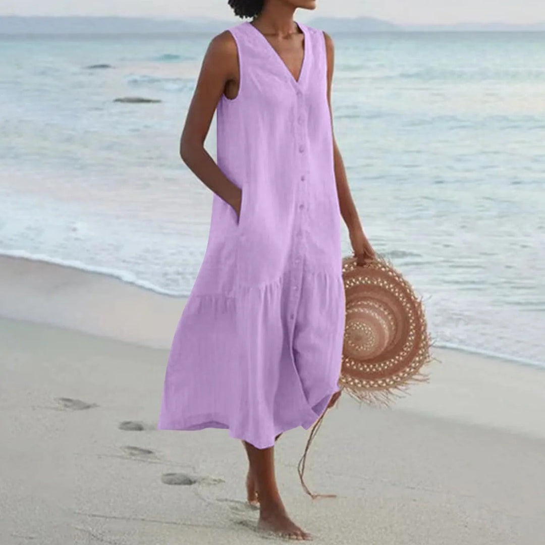 Veelzijdige dames zomerjurk, mouwloos met V-hals, ideaal voor casual lente outfits, stranddagen of vakantie.