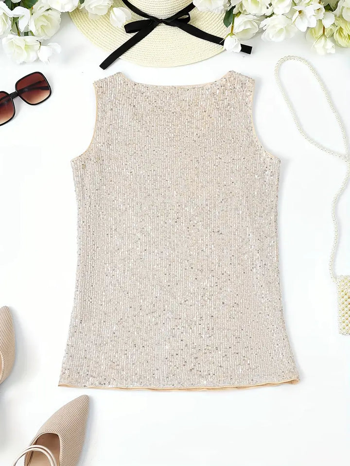 "Mouwloze top met V-hals, pailletten, elegante uitstraling, lichte stof; perfect voor zomer en avondjes uit."