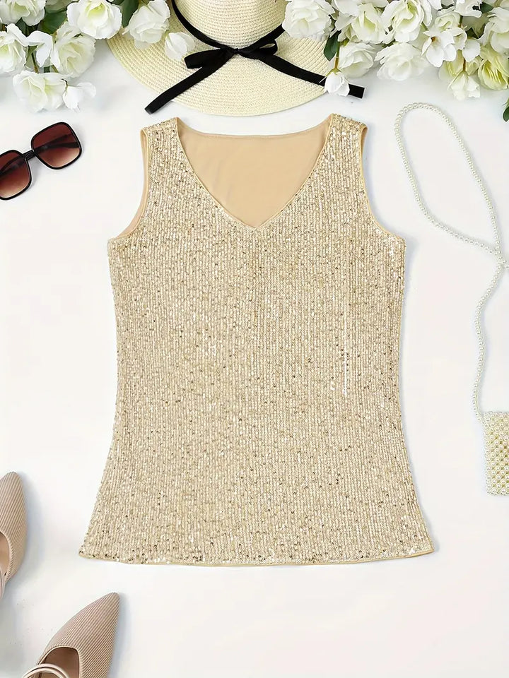 "Mouwloze top met V-hals, pailletten, elegante uitstraling, lichte stof; perfect voor zomer en avondjes uit."