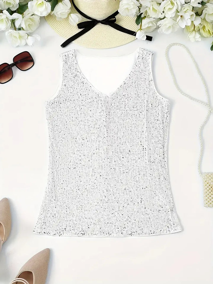 "Mouwloze top met V-hals, pailletten, elegante uitstraling, lichte stof; perfect voor zomer en avondjes uit."