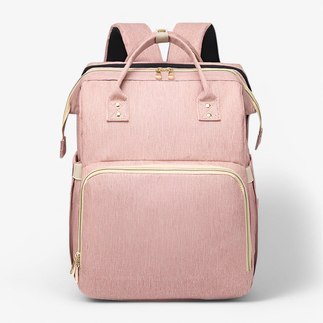 Compacte Noëlle luiertas die snel een veilig babybedje wordt; essentieel voor ouders onderweg.