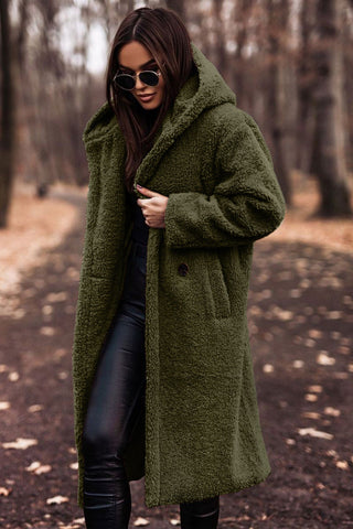 Modieuze dames winterjas: lange teddy jas met capuchon, ideaal voor een stijlvolle look.