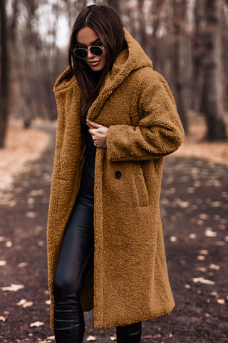 Lange teddy damesjas met capuchon. Modieus, comfortabel en perfect als winterjas voor vrouwen.