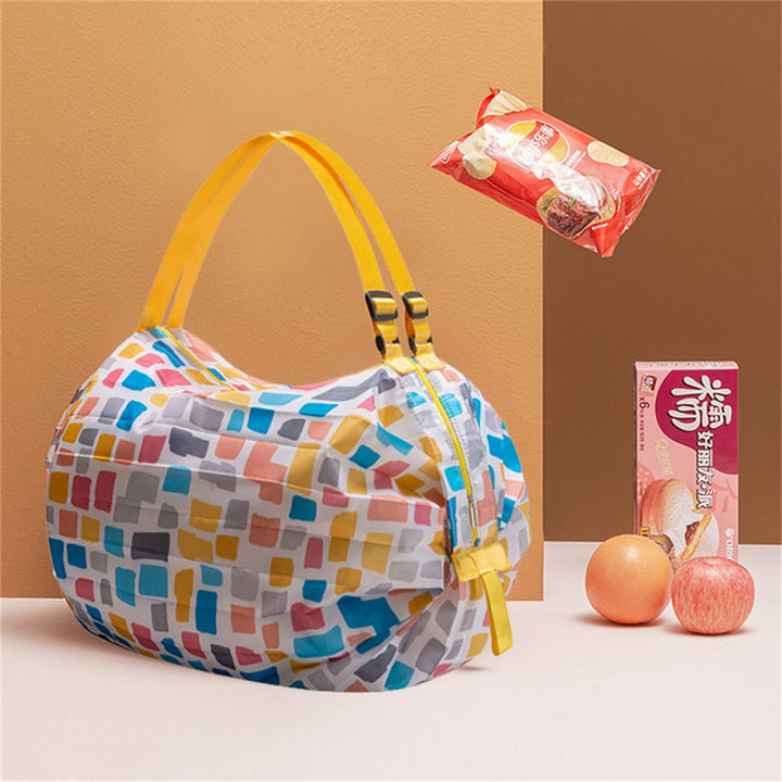 Lichtgewicht en compacte opvouwbare tas van oxford stof, perfect voor reizen, picknicks of onverwachte aankopen.