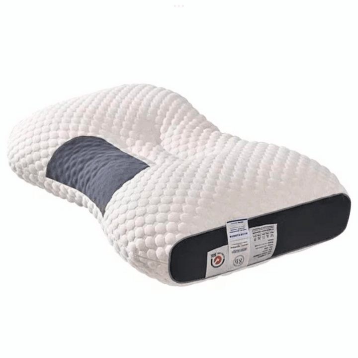 Orthopedisch kussen in zijaanzicht voor nek- en rugondersteuning, wit, ergonomische vorm, geschikt voor alle slaaphoudingen.