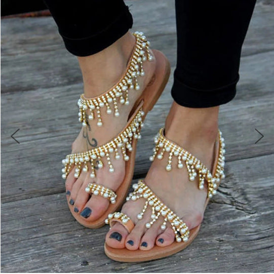 Stijlvolle Amara dames sandalen met platte zool en parels. Bieden orthopedisch comfort voor elke gelegenheid.