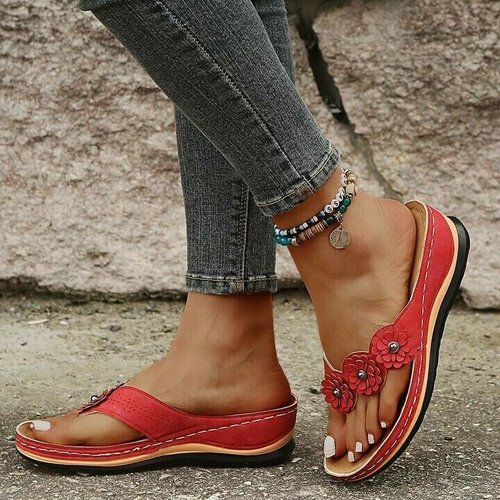 Stijlvolle dames sandalen Melina met chic bloemendetail; perfect voor een elegante zomerse look.