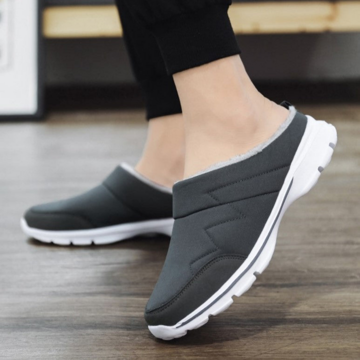 "Orthopedische herenpantoffels met warme voering en stevige antislipzool, perfect voor herfst en winter."