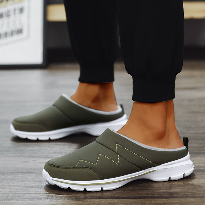 "Orthopedische herenpantoffels met warme voering en stevige antislipzool, perfect voor herfst en winter."