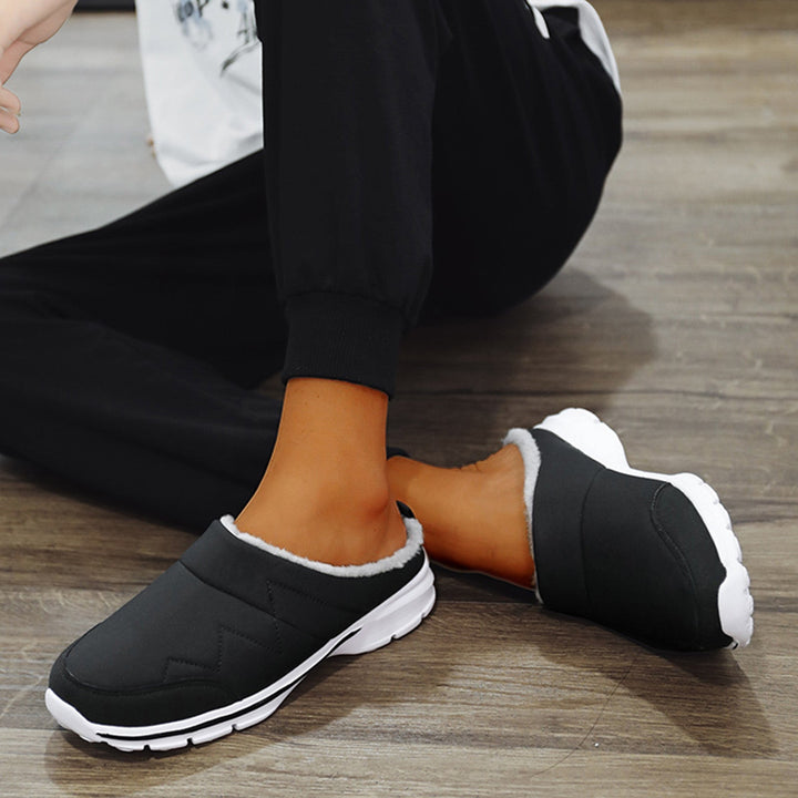 "Orthopedische herenpantoffels met warme voering en stevige antislipzool, perfect voor herfst en winter."