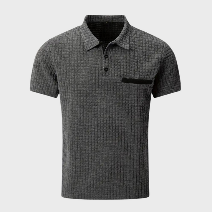 Donkergrijs herenpoloshirt met knoopsluiting en borstzakje
