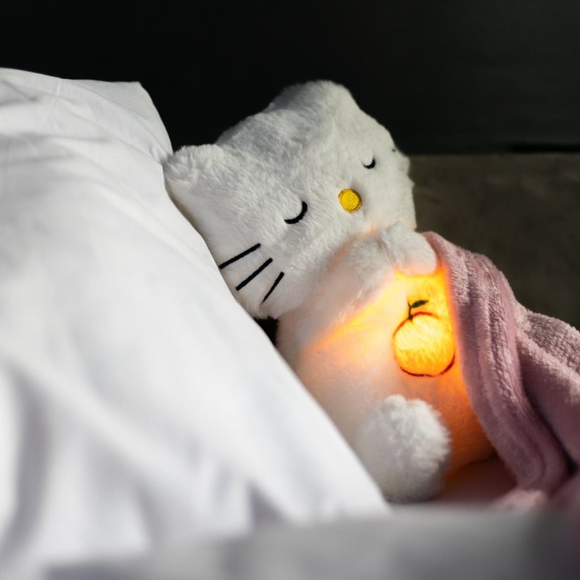 Schattig pluche dier met kalmerende ademhaling en ingebouwd nachtlampje; bevordert diepe slaap.