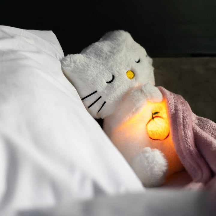 Schattig pluche dier met kalmerende ademhaling en ingebouwd nachtlampje; bevordert diepe slaap.