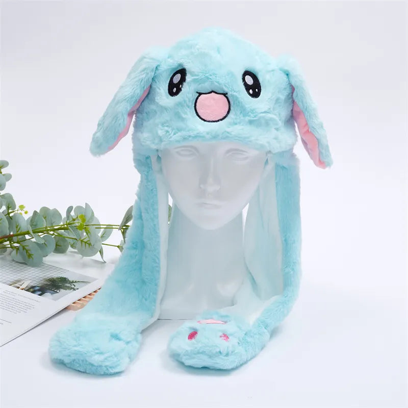 Pluche konijnenmuts met bewegende oren. Schattig en warm voor kinderen en volwassenen.