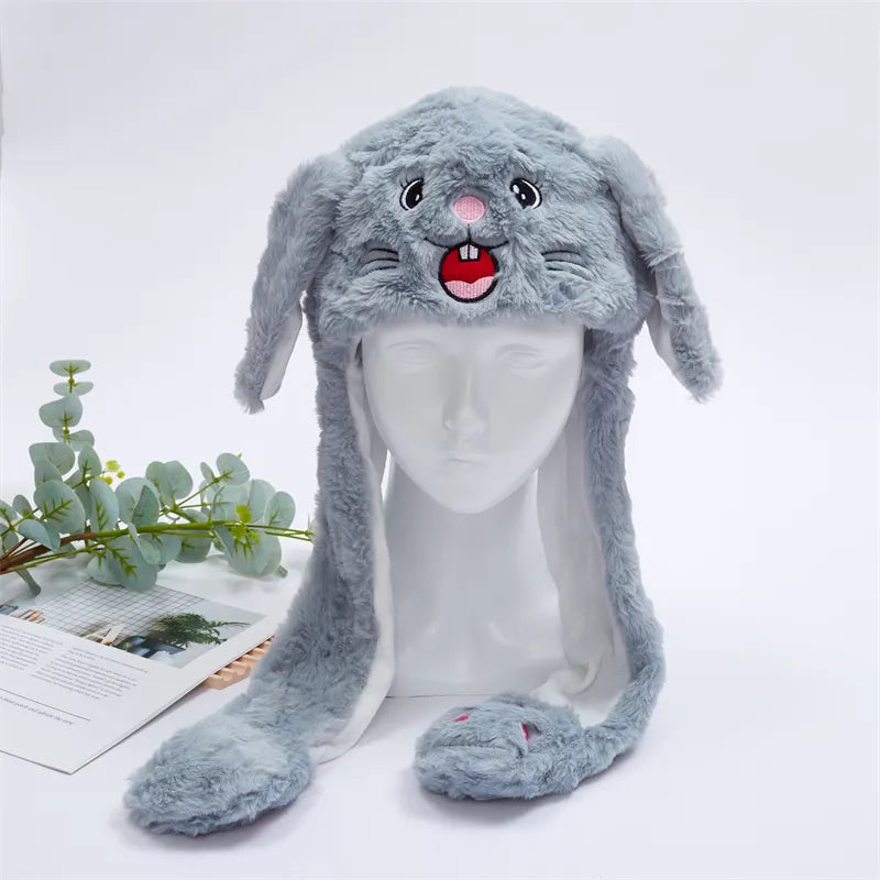 Pluche muts met grappige bewegende oren. Geschikt voor volwassenen en kinderen.