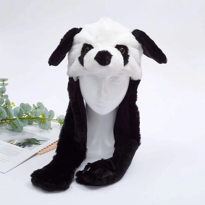 Zwarte BunnyBounce muts met beweegbare oren. Trendy en warm voor koude dagen.