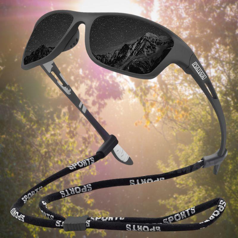 Stijlvolle unisex zonnebril getoond op een witte achtergrond, ideaal voor buitensport.