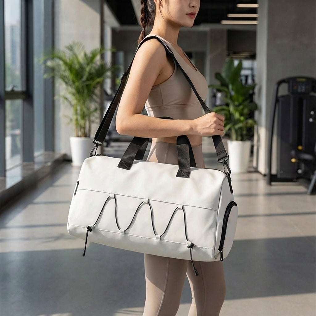 Praktische GearGlide reisduffel met ruim schoenvak en waterdicht nat compartiment, ideaal voor georganiseerd reizen.