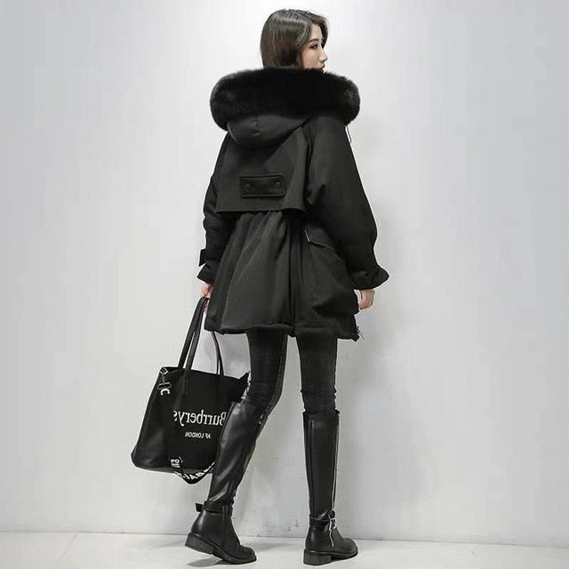 Damesjas, thermisch en verstelbaar, deze warme winterjas combineert stijl met functionaliteit.