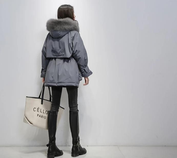 Thermische dames winterjas, elegant en modieus, biedt maximale warmte en stijl.
