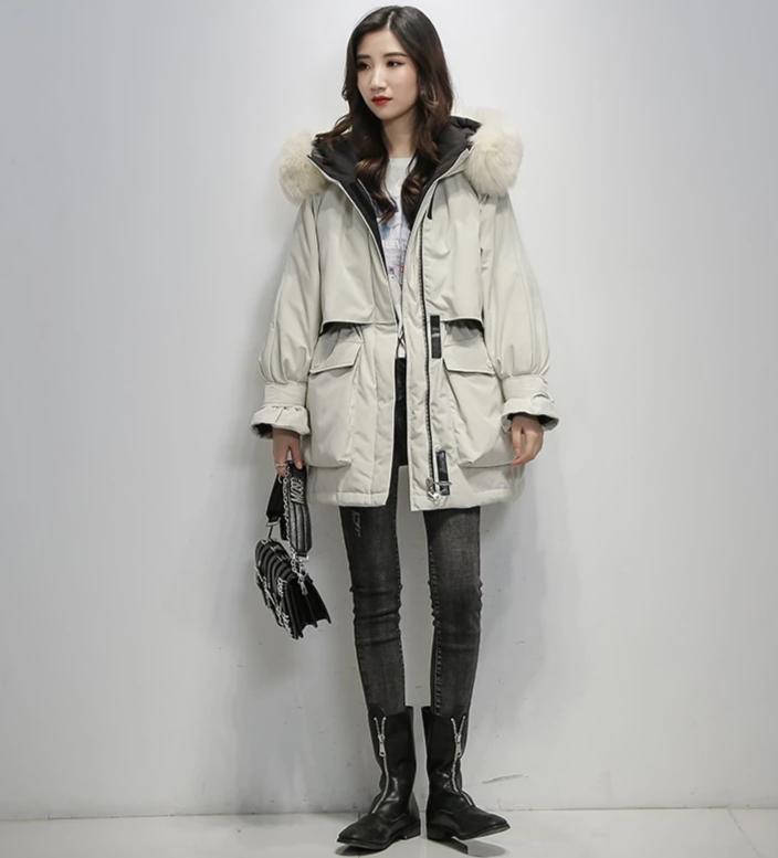 Dames winterjas met optimale warmte, elegante buitenkleding voor koudebescherming en stijl.