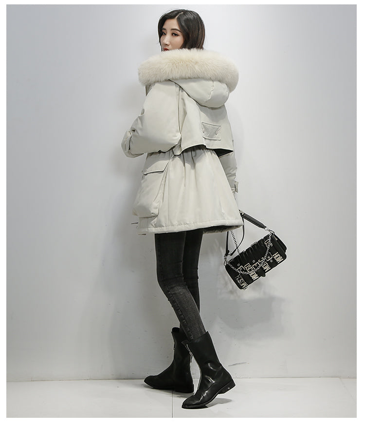 Stijlvolle winterjas voor dames, thermisch en elegant, biedt ultieme warmte tegen de kou.