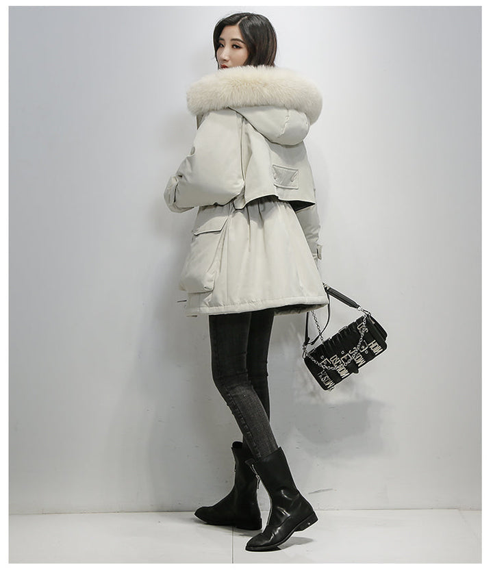 Stijlvolle winterjas voor dames, thermisch en elegant, biedt ultieme warmte tegen de kou.
