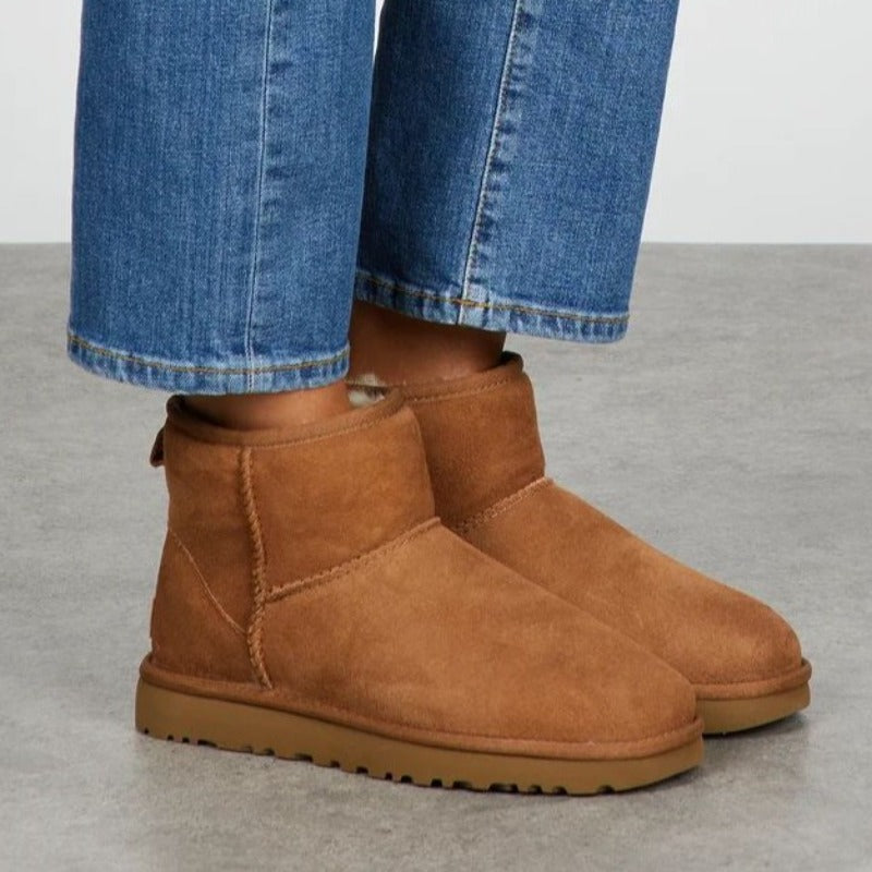 Dames winterlaarzen mini in grijs. Comfortabele en warme snowboots voor dagelijks casual gebruik.