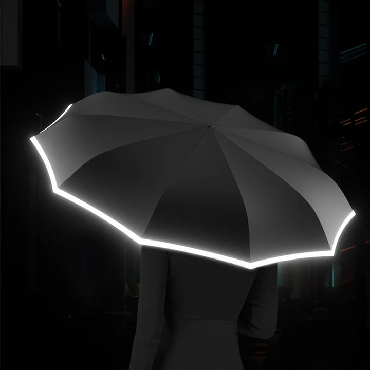Compacte reisparaplu, reflecterend en windbestendig, ideaal voor outdoor gebruik.