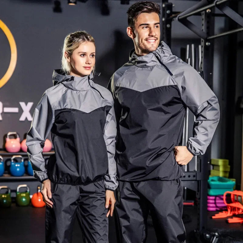 Compleet uniseks trainingspak van Remo met capuchon en ritssluiting, perfect voor elke sport.