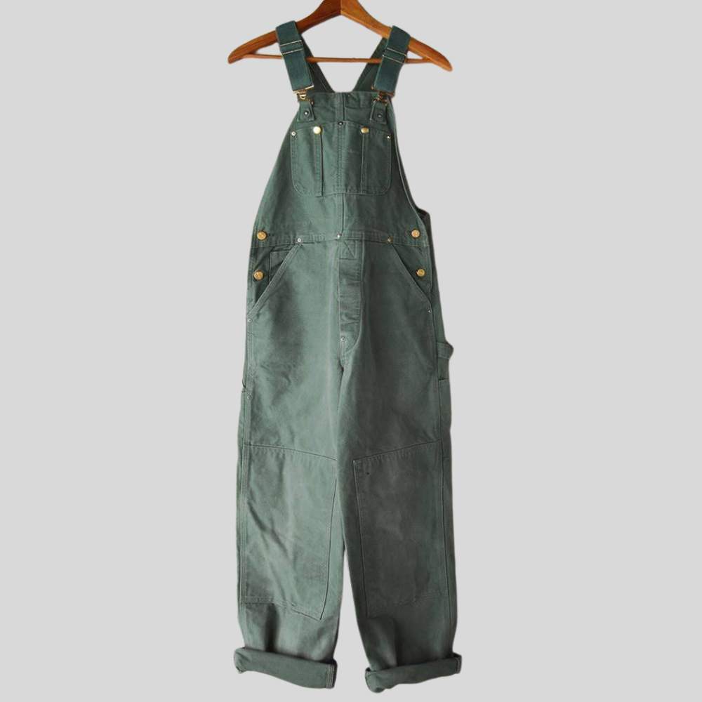 Casual denim dames tuinbroek met verstelbare bandjes. Comfortabele katoenmix jumpsuit, ideaal voor een relaxte retro stijl.