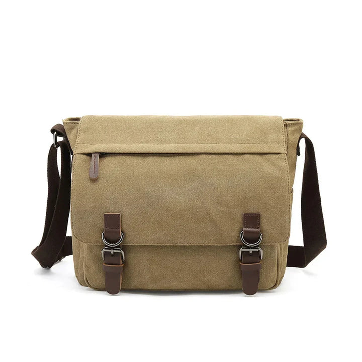 Assortiment robuuste heren canvas schoudertassen in bruin, zwart, blauw en legergroen.