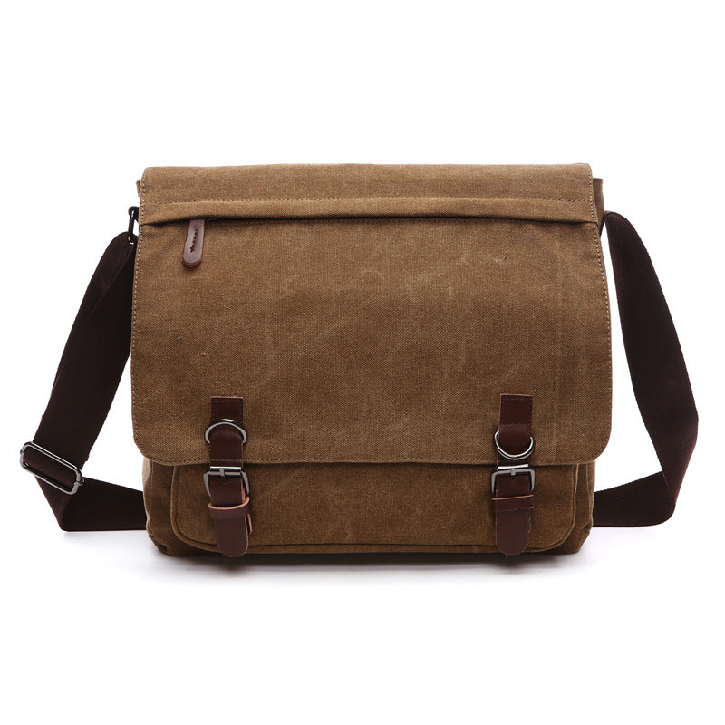 Tijdloze zwarte canvas crossbody tas, duurzaam en robuust voor dagelijks gebruik.