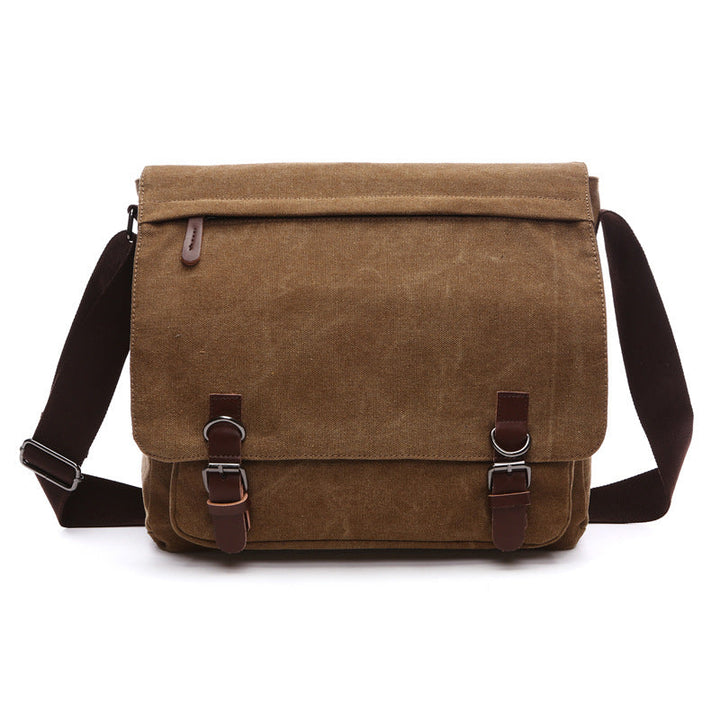 Tijdloze zwarte canvas crossbody tas, duurzaam en robuust voor dagelijks gebruik.