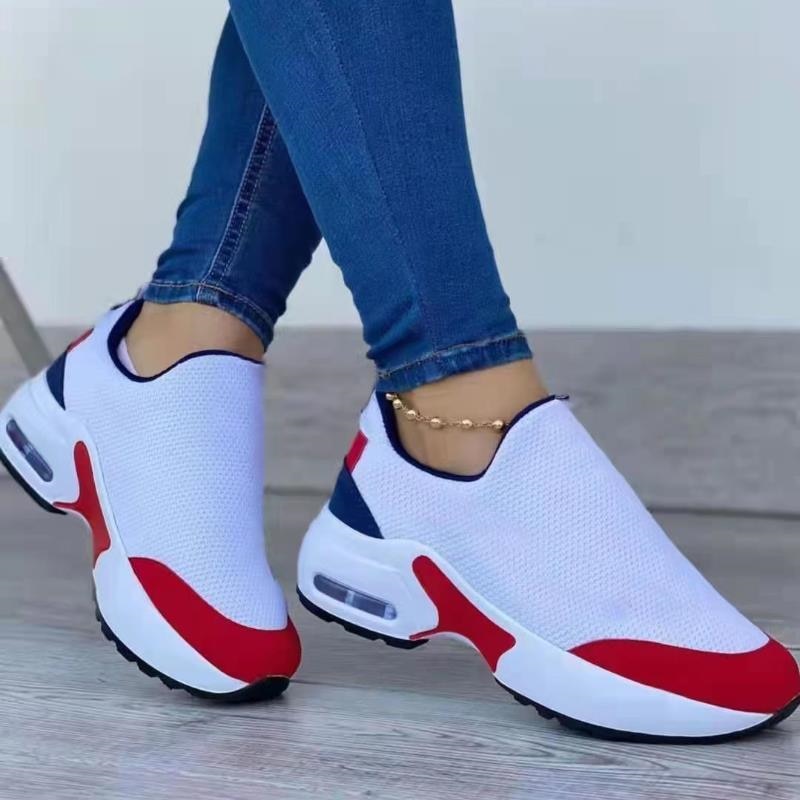Orthopedische rode sneakers voor dames, biedt comfort en optimale voetondersteuning. Ideaal voor lange dagen.