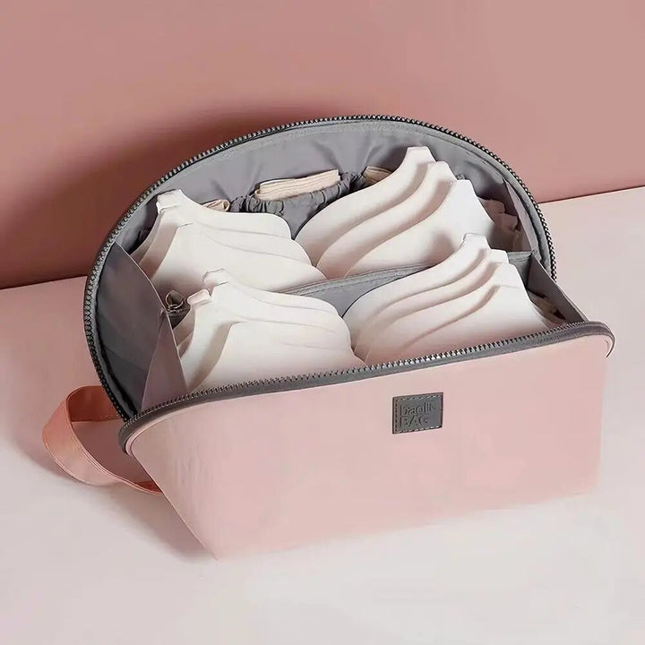 Gesloten compacte grijze Packify toilettas, een stijlvolle en praktische reistas accessoire voor iedere trip.