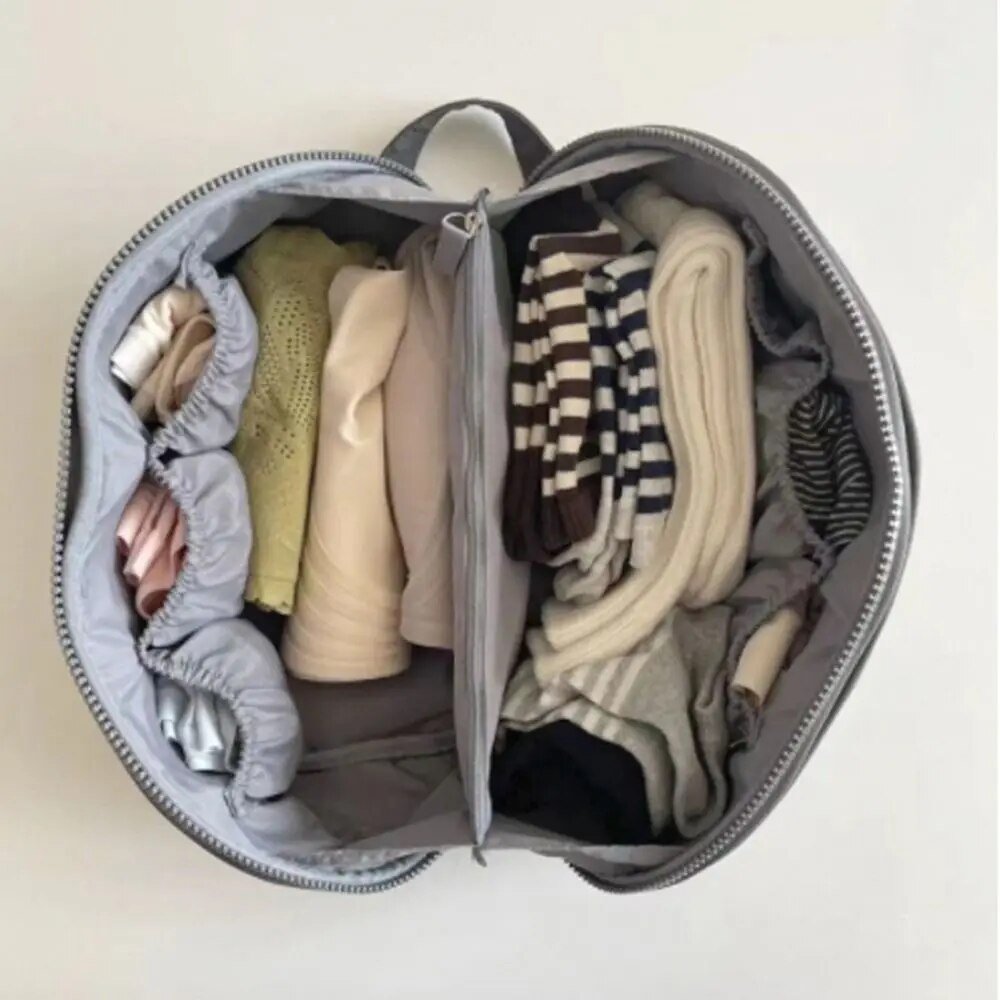 Veelzijdige roze Packify toilettas, ideaal als make-up organizer, reistas of opbergsysteem voor persoonlijke verzorging.