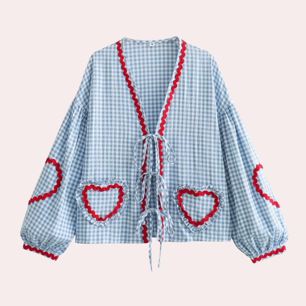 "Roze dames top met hartjesapplicatie en korte mouwen, comfortabele pasvorm ideaal voor casual outfits."